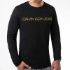 Remise 🎉 Tee 👚 Shirt Manches Longues Gold Institutional 7721 Noir Doré de Calvin Klein 😉