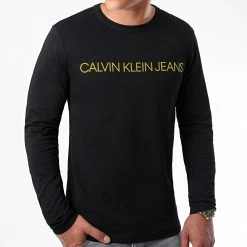 Remise 🎉 Tee 👚 Shirt Manches Longues Gold Institutional 7721 Noir Doré de Calvin Klein 😉