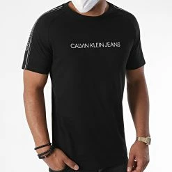 Meilleur prix 💯 Tee 👕 Shirt A Bandes Logo Tape Shoulder 5983 Noir de Calvin Klein 😀 -France Calvin Klein Soldes 2024 calvin klein 227174 J30J315983 BAE 20200731T142538 03