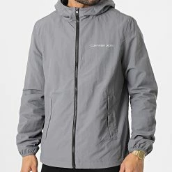De gros ✨ Veste Zippée Capuche Institutional Logo 0329 Gris de Calvin Klein 🛒