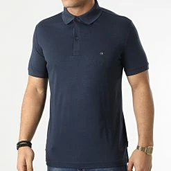 Nouveau 🛒 Polo Manches Courtes Liquid Touch Slim 7090 Bleu Marine de Calvin Klein ✨