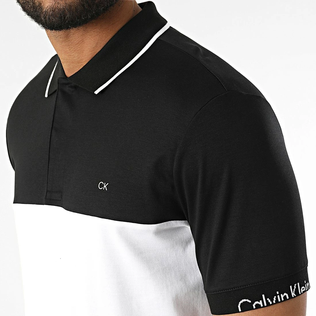 Meilleure affaire 💯 Polo A Manches Courtes Liquid Touch Blocking Logo 8730 Blanc Noir de Calvin Klein 🛒 2 Meilleure affaire 💯 Polo A Manches Courtes Liquid Touch Blocking Logo 8730 Blanc Noir de Calvin Klein 🛒 – Image 2