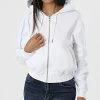 De gros 🔥 Sweat Capuche Zippé Femme A Bandes 8981 Blanc de Calvin Klein 🌟