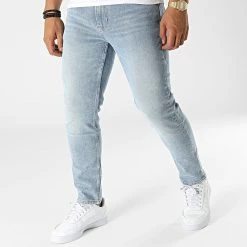 Vente flash 🛒 Jean Regular Dad 1513 Bleu Wash de Calvin Klein ✨