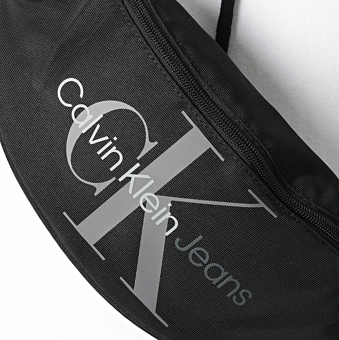 Coupon 💯 Sac Banane Sport Essentials 9352 Noir de Calvin Klein ✔️ 2 Coupon 💯 Sac Banane Sport Essentials 9352 Noir de Calvin Klein ✔️ – Image 2