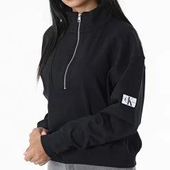 Sortie 👍 Sweat Col Montant Zippé Femme Badge 9652 Noir de Calvin Klein 🥰