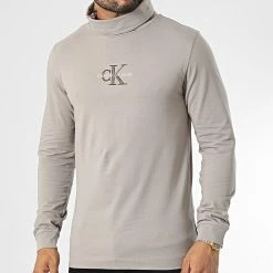 Le moins cher 🎁 Tee 👕 Shirt Manches Longues Col Roulé 1701 Beige Foncé de Calvin Klein 🎁