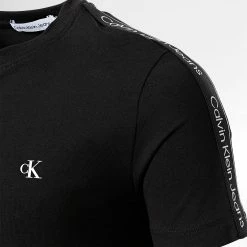 Meilleure vente ⭐ Tee 👕 Shirt Enfant A Bandes Logo Tape 1565 Noir de Calvin Klein 🧨 3 Meilleure vente ⭐ Tee 👕 Shirt Enfant A Bandes Logo Tape 1565 Noir de Calvin Klein 🧨 -France Calvin Klein Soldes 2024 calvin klein 344518 IB0IB01565 BEH 20221028T122634 02