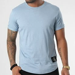 Budget ✔️ Tee 👚 Shirt Oversize 5319 Bleu Clair de Calvin Klein 🌟
