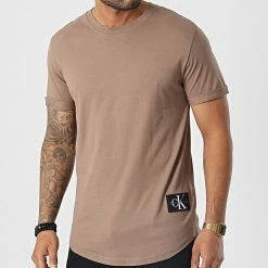 Offres 🥰 Tee 👕 Shirt Oversize 5319 Marron de Calvin Klein 🔥